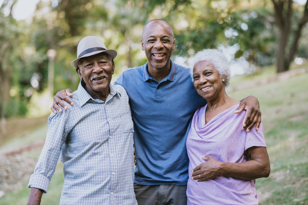 Portrait of a senior couple with adult son